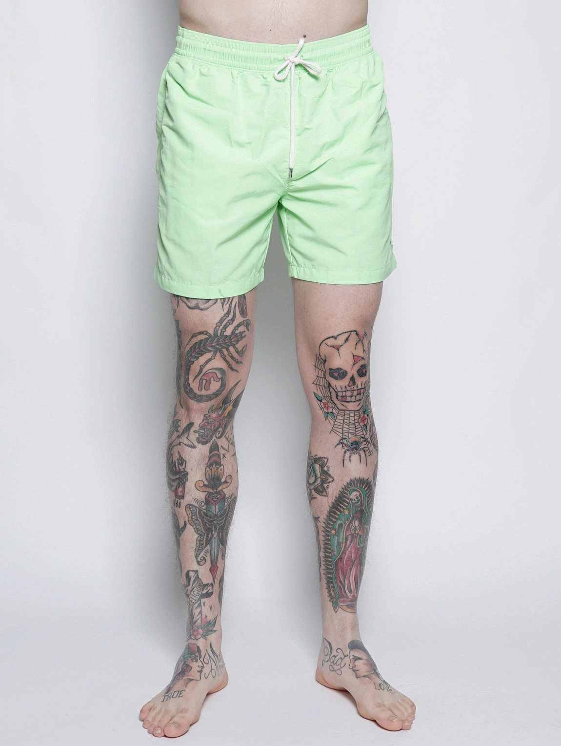 Green swim shorts