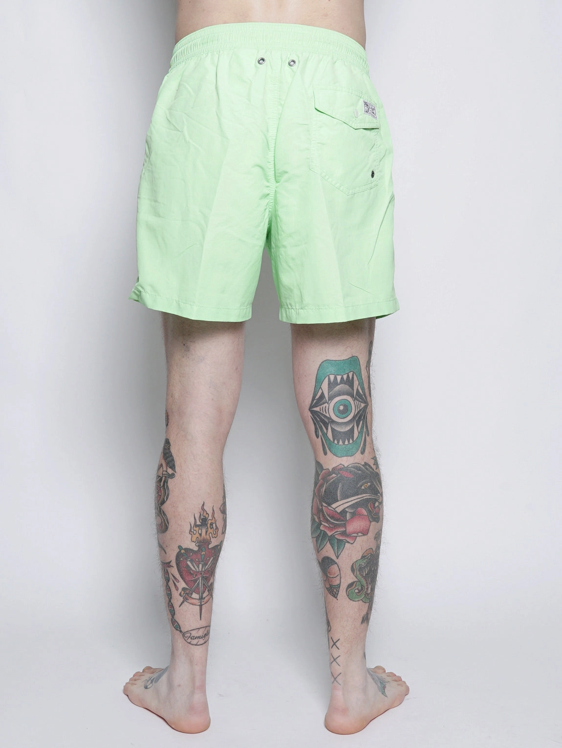 Green swim shorts